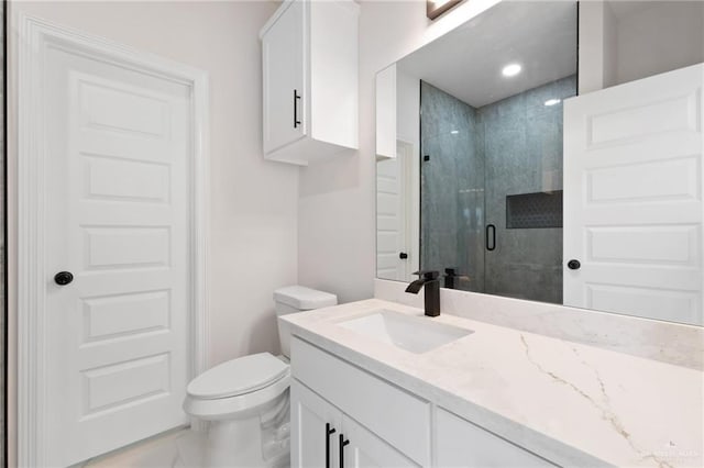 2203 San Charbel St, San Juan, TX 78589 - bathroom with toilet, a stall shower, and vanity