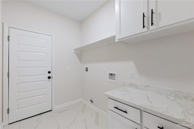 2203 San Charbel St, San Juan, TX 78589 - washroom featuring electric dryer hookup, baseboards, washer hookup, cabinet space, and marble finish floor