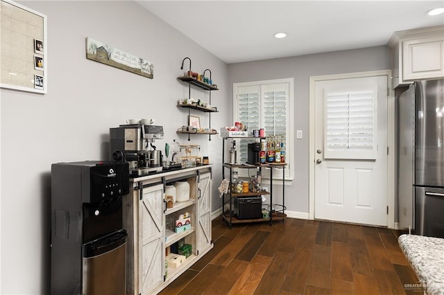 kitchen with dark wood finished floors, recessed lighting, freestanding refrigerator, white cabinets, and open shelves