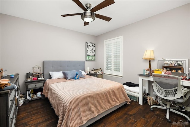 bedroom with wood finished floors and a ceiling fan