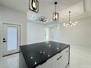 8104 N 51st St N, Mcallen, TX 78504 - kitchen with a chandelier