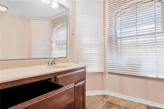 bathroom featuring tile patterned floors and vanity