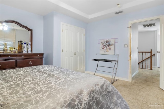 bedroom with light colored carpet