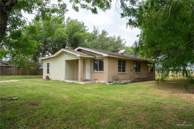 16877 Borchardt St, Harlingen, TX 78552 - view of front facade with brick siding