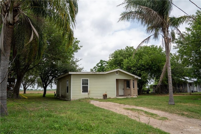 16877 Borchardt St, Harlingen, TX 78552 - view of front of home featuring a front yard