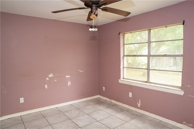 16877 Borchardt St, Harlingen, TX 78552 - unfurnished room with healthy amount of natural light, ceiling fan, light tile patterned flooring, and baseboards