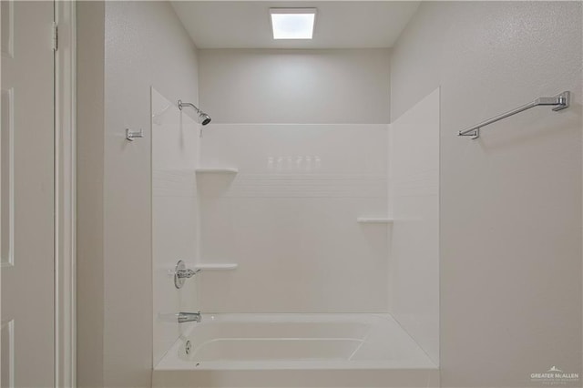 bathroom with shower / bath combination