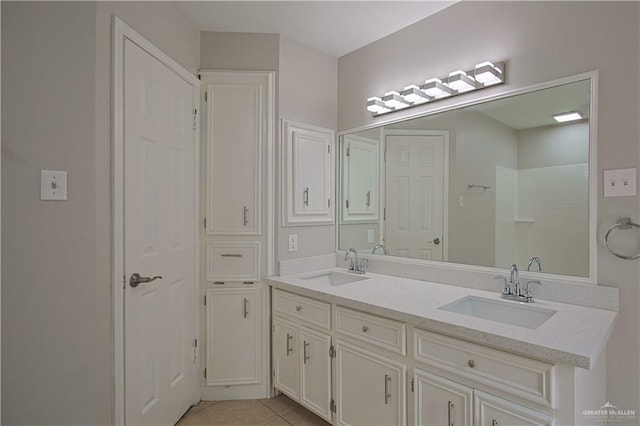 bathroom featuring vanity and tile patterned flooring