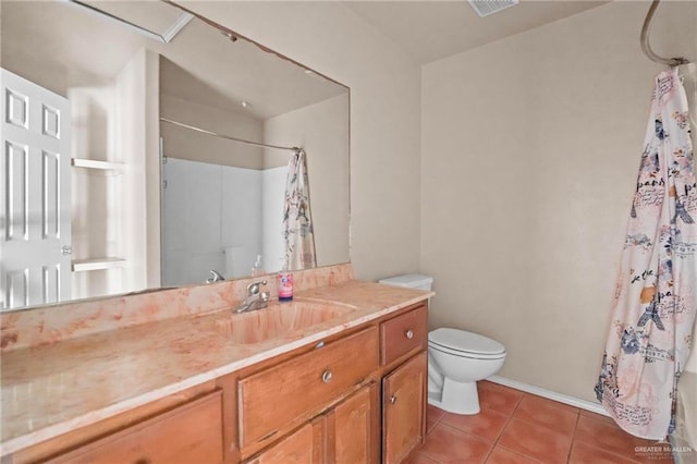 bathroom featuring tile patterned flooring, vanity, toilet, and a shower with shower curtain