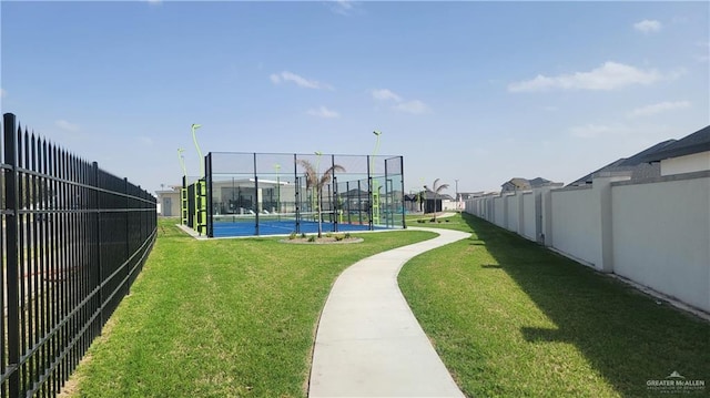2701 E Versace Dr, Edinburg, TX 78542 - view of property's community featuring a tennis court