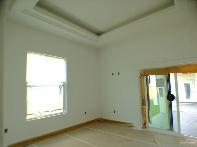 2701 E Versace Dr, Edinburg, TX 78542 - unfurnished room featuring crown molding, baseboards, and a tray ceiling