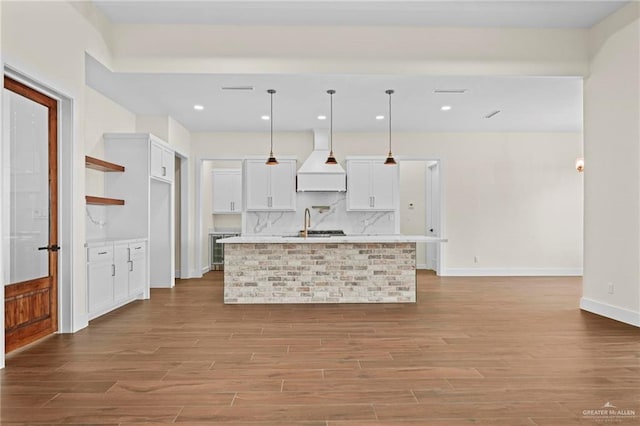 bar with wine cooler, light stone countertops, dark hardwood / wood-style flooring, and white cabinets