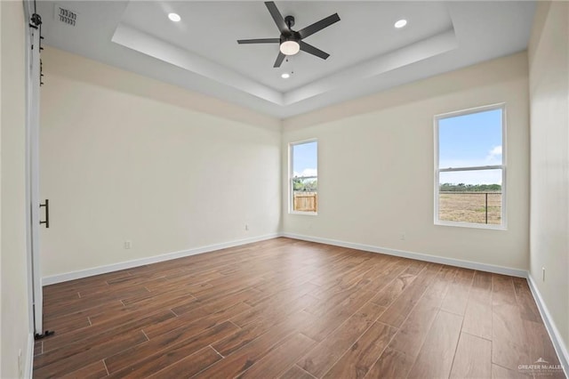 washroom with hookup for an electric dryer, hookup for a washing machine, cabinets, sink, and dark hardwood / wood-style floors