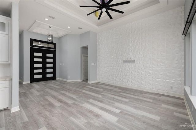 5904 N Dodger St, Pharr, TX 78577 - entryway with a raised ceiling, light wood-style flooring, ceiling fan, baseboards, and recessed lighting