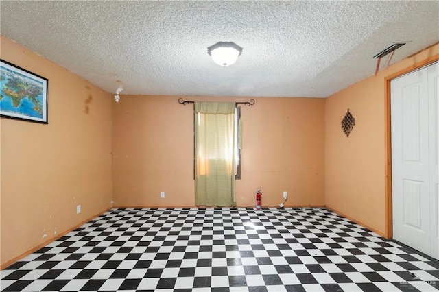 3204 Barbara Ln, Edinburg, TX 78542 - unfurnished room with tile patterned floors and a textured ceiling