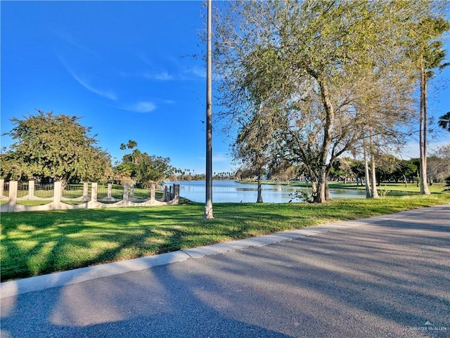 307 Bolivar Ave Unit 2, Rancho Viejo, TX 78575 - view of road featuring a water view