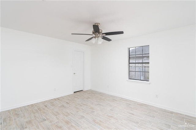 117 Keystone St, Mission, TX 78572 - spare room with a ceiling fan, baseboards, and light wood-style floors