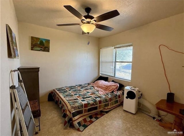 711 Marcos Hinojosa Ave, Hebbronville, TX 78361 - bedroom featuring a textured ceiling and ceiling fan