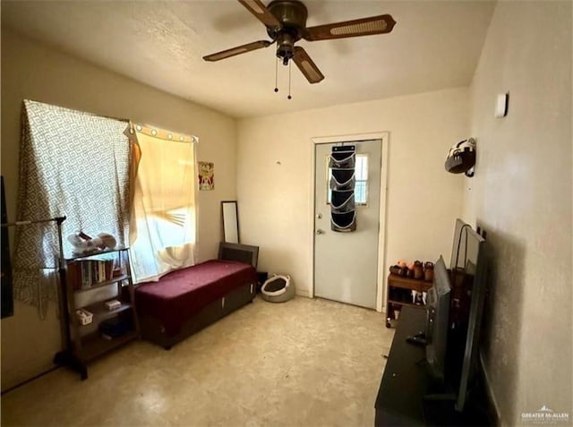 711 Marcos Hinojosa Ave, Hebbronville, TX 78361 - sitting room featuring a ceiling fan and tile patterned floors