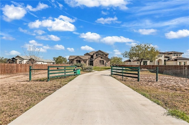 view of home's community with a yard