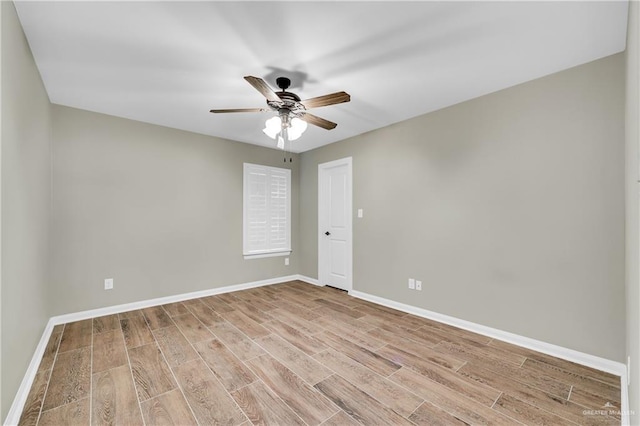 unfurnished room featuring light hardwood / wood-style floors and ceiling fan