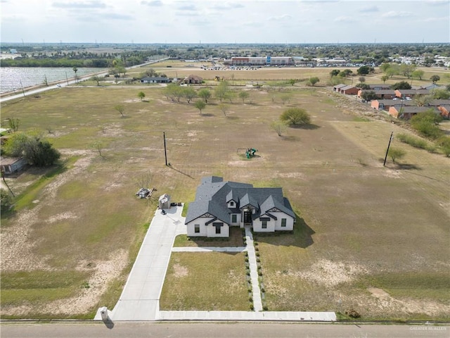 birds eye view of property featuring a rural view