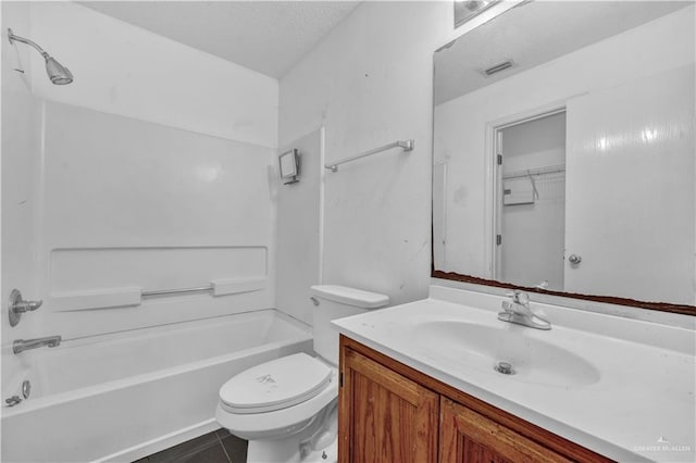 1101 Boston St, Edinburg, TX 78541 - bathroom with vanity, bathtub / shower combination, toilet, tile patterned flooring, and visible vents