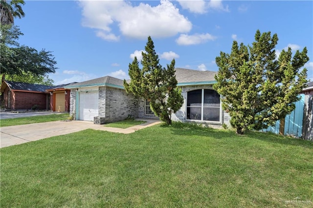 1101 Boston St, Edinburg, TX 78541 - view of front of house with a garage, brick siding, a front yard, and concrete driveway
