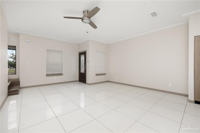 3302 S Sugar Rd Unit E, Edinburg, TX 78539 - empty room featuring a ceiling fan and baseboards