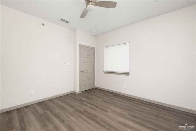3302 S Sugar Rd Unit E, Edinburg, TX 78539 - unfurnished room featuring wood finished floors, baseboards, and a ceiling fan