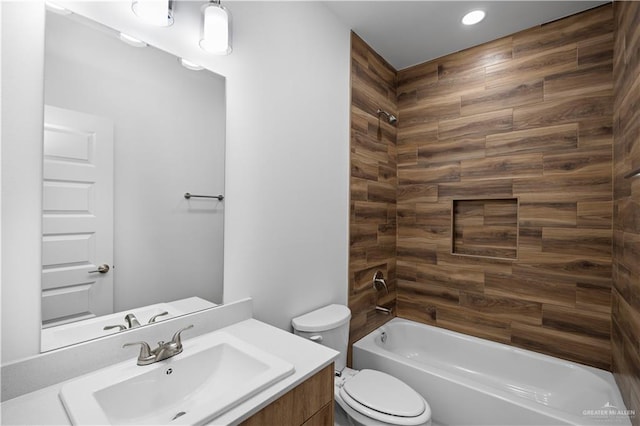 full bathroom featuring shower / tub combination, vanity, and toilet