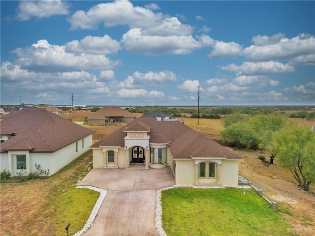 view of front of property with a front yard