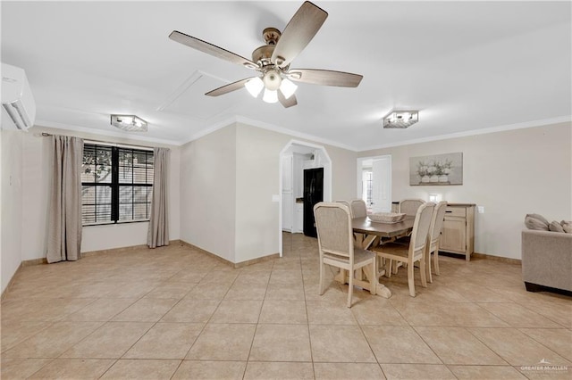 dining room with a wall unit AC, light tile patterned floors, crown molding, and baseboards