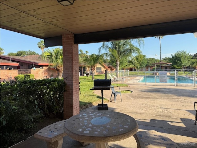 800 E Dallas Ave Unit 17, Mcallen, TX 78501 - view of patio / terrace featuring a community pool