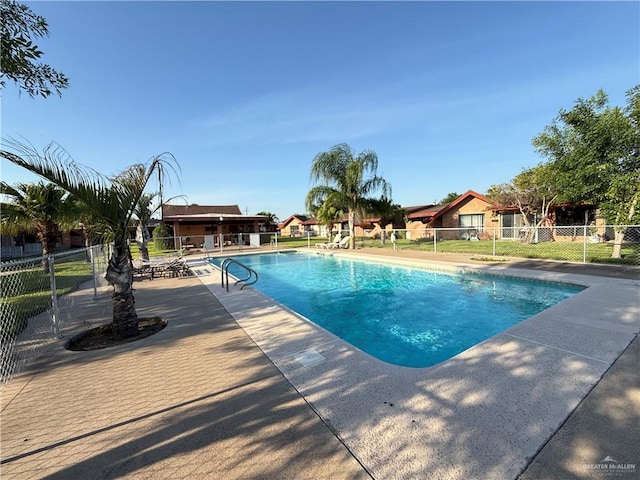 800 E Dallas Ave Unit 17, Mcallen, TX 78501 - view of swimming pool featuring fence and a patio