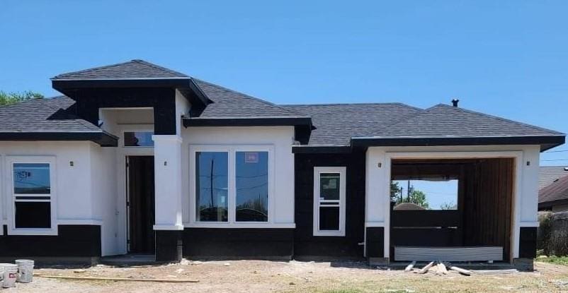 220 N Tecate Dr, Mission, TX 78572 - view of front of house with a shingled roof