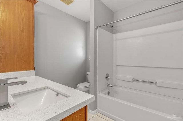 full bathroom featuring tile patterned floors, vanity,  shower combination, and toilet