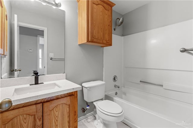 full bathroom featuring tile patterned flooring, vanity, bathing tub / shower combination, and toilet