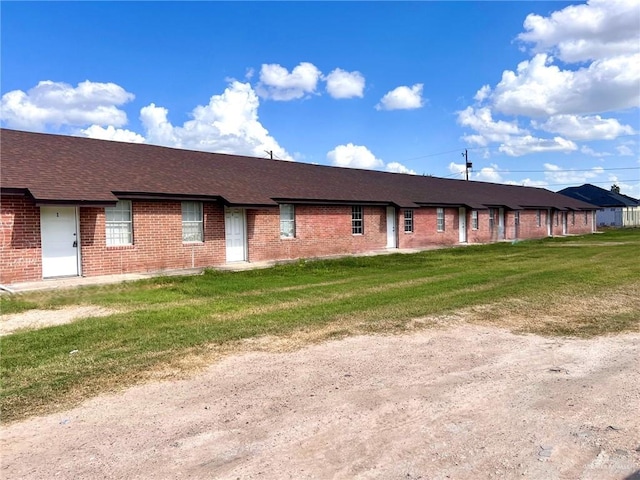 exterior space with a front yard