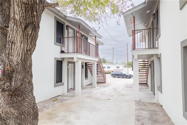 view of home's exterior with a carport