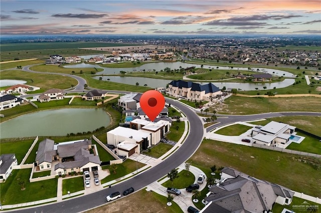 4704 Estancia Pkwy, Mcallen, TX 78504 - aerial view at dusk of a water view and a residential view