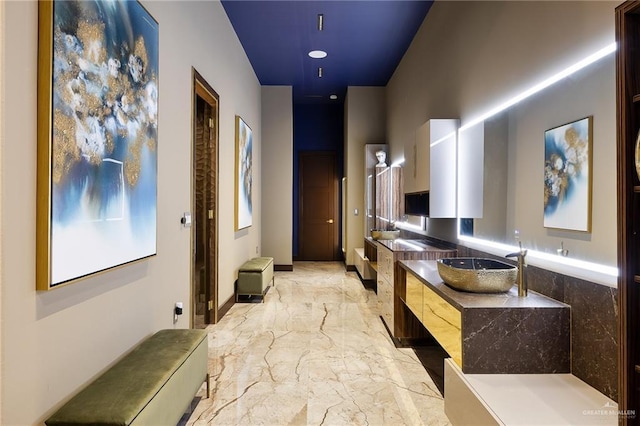 4704 Estancia Pkwy, Mcallen, TX 78504 - bathroom featuring marble tiled flooring and vanity
