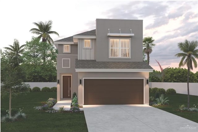 view of front of home with a garage, fence, a lawn, and driveway