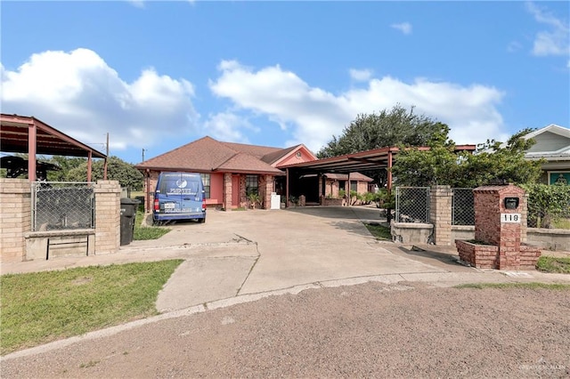 view of front of home with a carport