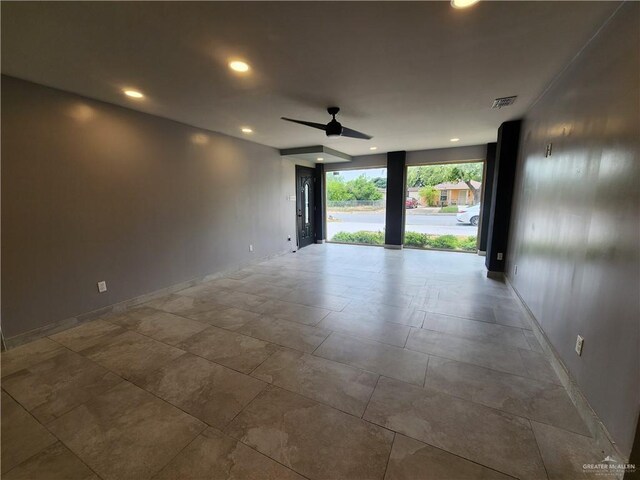 607 N Padre Ave, Weslaco, TX 78596 - spare room with ceiling fan and recessed lighting