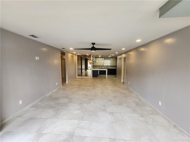 607 N Padre Ave, Weslaco, TX 78596 - hallway featuring recessed lighting and baseboards