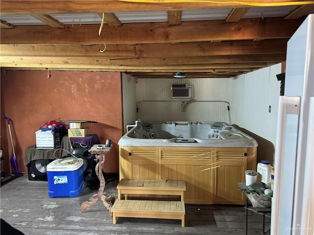 basement featuring a wall unit AC