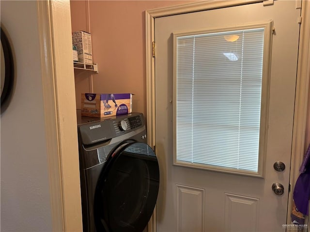 laundry room with washer / clothes dryer