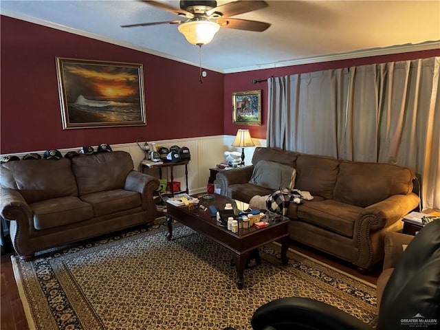 living room with ceiling fan, hardwood / wood-style floors, lofted ceiling, and ornamental molding