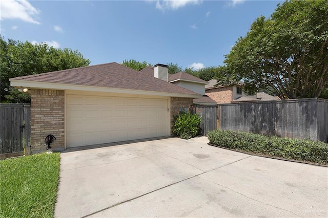 2009 E 29th St, Mission, TX 78574 - view of front facade featuring brick siding, concrete driveway, a garage, and a shingled roof